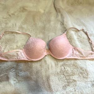 Lacy pink bra. 36B Straps laced too